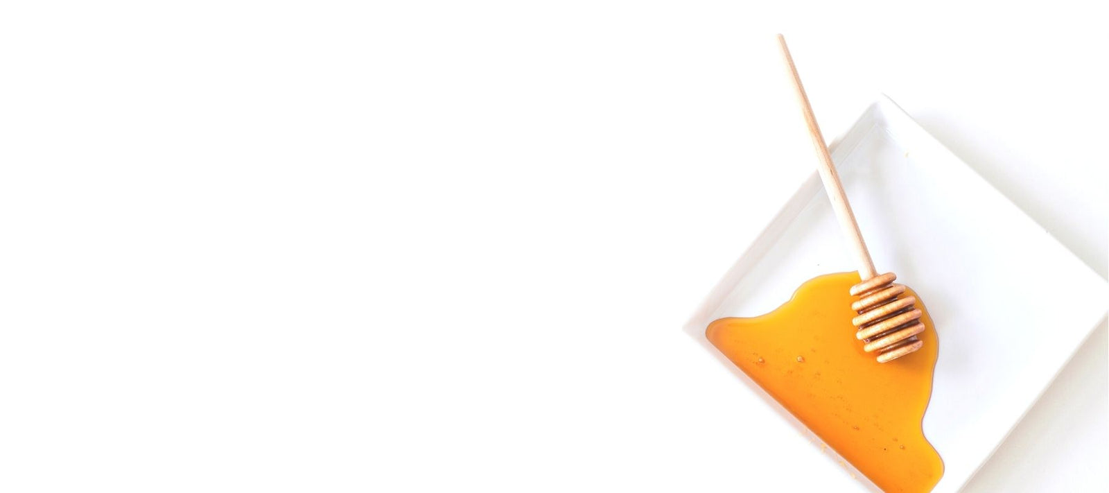 How much honey does a bee consume for wax