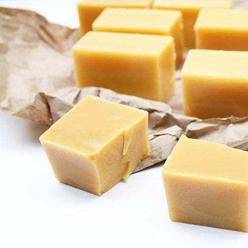 mending beeswax bar for repairing old worn beeswax wraps made from jojoba oil, tree resin, beeswax, and cotton fabric